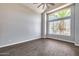 Bright living room with large windows and hardwood floors at 20382 N 53Rd Ave, Glendale, AZ 85308