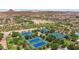 Aerial view showing multiple tennis and pickleball courts at 8454 W Mantle Way, Florence, AZ 85132