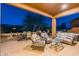 Outdoor patio furniture and dining set create an inviting space at 7082 E Palo Brea Dr, Gold Canyon, AZ 85118