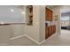 Hallway with built-in shelves and a view into another room at 15439 E Acacia Way, Fountain Hills, AZ 85268