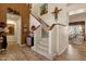 Elegant staircase with carpeted steps and a wooden handrail at 15439 E Acacia Way, Fountain Hills, AZ 85268