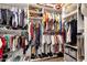 Large walk-in closet with ample shelving and hanging space at 15439 E Acacia Way, Fountain Hills, AZ 85268
