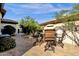Charming patio area with a table and chairs for outdoor dining at 15439 E Acacia Way, Fountain Hills, AZ 85268