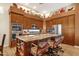 Large kitchen with granite countertops, stainless steel appliances, and an abundance of cabinetry at 15439 E Acacia Way, Fountain Hills, AZ 85268
