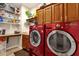 Bright laundry room, features washer, dryer, and ample storage at 15439 E Acacia Way, Fountain Hills, AZ 85268