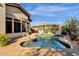Inviting kidney-shaped pool with a convenient patio area at 15439 E Acacia Way, Fountain Hills, AZ 85268