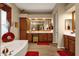 Luxurious bathroom with double vanities and a soaking tub at 15439 E Acacia Way, Fountain Hills, AZ 85268