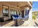 Covered patio with seating area and view of the pool at 15439 E Acacia Way, Fountain Hills, AZ 85268