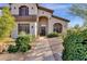 Landscaped front yard with a walkway leading to the entry of a two-story house at 15439 E Acacia Way, Fountain Hills, AZ 85268