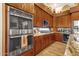 Well-equipped kitchen featuring double ovens, granite countertops, and stylish cabinetry at 15439 E Acacia Way, Fountain Hills, AZ 85268