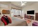 Main bedroom with a king-size bed and access to a private patio at 15439 E Acacia Way, Fountain Hills, AZ 85268