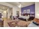 Main bedroom with a king-size bed and access to a private patio at 15439 E Acacia Way, Fountain Hills, AZ 85268
