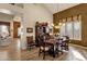 Dining room with a wood table and chairs, hardwood floors, and a built-in hutch at 15439 E Acacia Way, Fountain Hills, AZ 85268