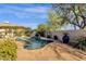 Relaxing kidney-shaped pool with a spacious patio area at 15439 E Acacia Way, Fountain Hills, AZ 85268