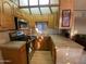 L-shaped kitchen boasts stainless steel appliances and wood cabinetry at 1206 W Klamath Dr, Apache Junction, AZ 85119