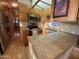 Open kitchen with stainless steel appliances and ample counter space at 1206 W Klamath Dr, Apache Junction, AZ 85119