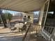 Covered patio with outdoor furniture and table at 1206 W Klamath Dr, Apache Junction, AZ 85119