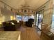 Relaxing living room with a couch, recliner, and access to outdoor patio at 1206 W Klamath Dr, Apache Junction, AZ 85119
