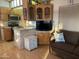 Open concept kitchen and living room in a mobile home at 1206 W Klamath Dr, Apache Junction, AZ 85119