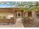 Home's entryway features a stone walkway, landscaping, and architectural details at 15857 E Ponderosa Dr, Fountain Hills, AZ 85268