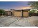 Two-story home with three-car garage and desert landscaping at 2378 N 158Th Dr, Goodyear, AZ 85395