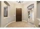 Elegant entryway with high ceilings and hardwood floors at 2378 N 158Th Dr, Goodyear, AZ 85395