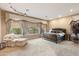 Large main bedroom with plush carpet and ample natural light at 2378 N 158Th Dr, Goodyear, AZ 85395