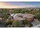 Luxury home with solar panels, spacious driveway, and beautifully landscaped yard at 2378 N 158Th Dr, Goodyear, AZ 85395