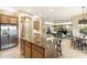 Open kitchen with large island and views into living room at 2378 N 158Th Dr, Goodyear, AZ 85395