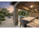 Inviting backyard with pool, fire pit, and patio at 2378 N 158Th Dr, Goodyear, AZ 85395