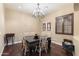 Formal dining room with chandelier and hardwood floors at 2378 N 158Th Dr, Goodyear, AZ 85395