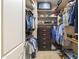 Spacious walk-in closet with custom shelving and drawers at 2378 N 158Th Dr, Goodyear, AZ 85395