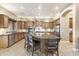 Gourmet kitchen featuring granite countertops and stainless steel appliances at 2378 N 158Th Dr, Goodyear, AZ 85395