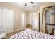 Cozy bedroom with a bed and access to a full bathroom at 2378 N 158Th Dr, Goodyear, AZ 85395