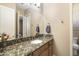 Bathroom with granite countertop and single vanity at 2378 N 158Th Dr, Goodyear, AZ 85395