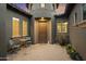 Private courtyard with seating area and brick pavers at 2378 N 158Th Dr, Goodyear, AZ 85395