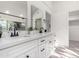 Elegant bathroom with a double vanity and modern fixtures at 10338 E San Salvador Dr, Scottsdale, AZ 85258