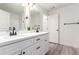 Double vanity bathroom with gray vinyl flooring at 10338 E San Salvador Dr, Scottsdale, AZ 85258