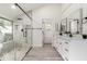 Spa-like bathroom with a large walk-in shower and double vanity at 10338 E San Salvador Dr, Scottsdale, AZ 85258