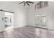 Spacious bedroom with sliding barn door and access to private bathroom at 10338 E San Salvador Dr, Scottsdale, AZ 85258