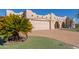 Single story home with stucco exterior, double garage and manicured lawn at 9518 W Hidden Valley Cir, Sun City, AZ 85351