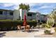 Community patio with seating and BBQ grill at 4630 N 68Th St # 248, Scottsdale, AZ 85251