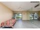 Spacious bedroom with patio access and mirrored wall at 4630 N 68Th St # 248, Scottsdale, AZ 85251