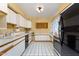 Bright kitchen with ample cabinetry and tile flooring at 4630 N 68Th St # 248, Scottsdale, AZ 85251