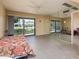 Comfortable bedroom with mirrored wall and access to patio at 4630 N 68Th St # 248, Scottsdale, AZ 85251