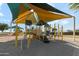 Playground with various play structures and shaded areas at 38120 W Excussare Way, Maricopa, AZ 85138