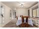 Dining room with a built-in hutch and four chairs at 8228 E Calypso Ave, Mesa, AZ 85208