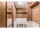 Large walk-in closet with double hanging rods at 8228 E Calypso Ave, Mesa, AZ 85208