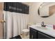 Clean bathroom with updated vanity and shower at 8228 E Calypso Ave, Mesa, AZ 85208