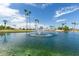 Serene lake view featuring a lovely fountain at 8228 E Calypso Ave, Mesa, AZ 85208